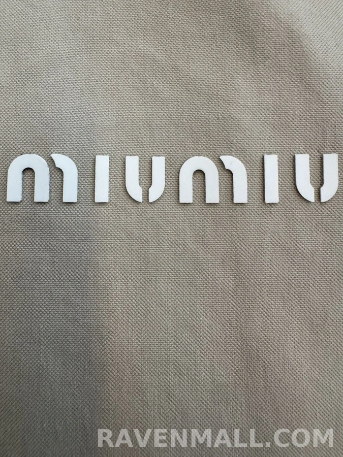 미우미우 미우미우 라이트 후드 롱집업 상세 이미지